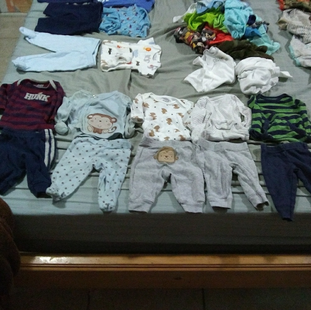 *SOLD* Five long sleeve newborn baby boy outfits